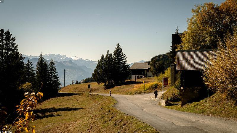 happy healthy fitness woman sitting on yoga mat smiling