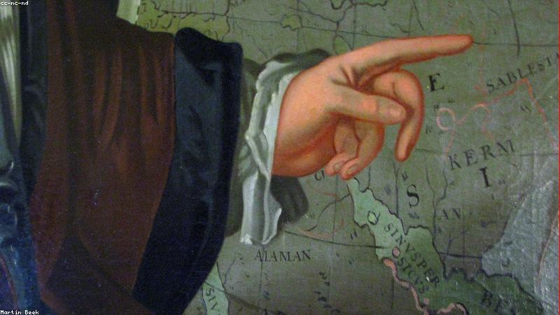 close up hands using yoga block for stretching support